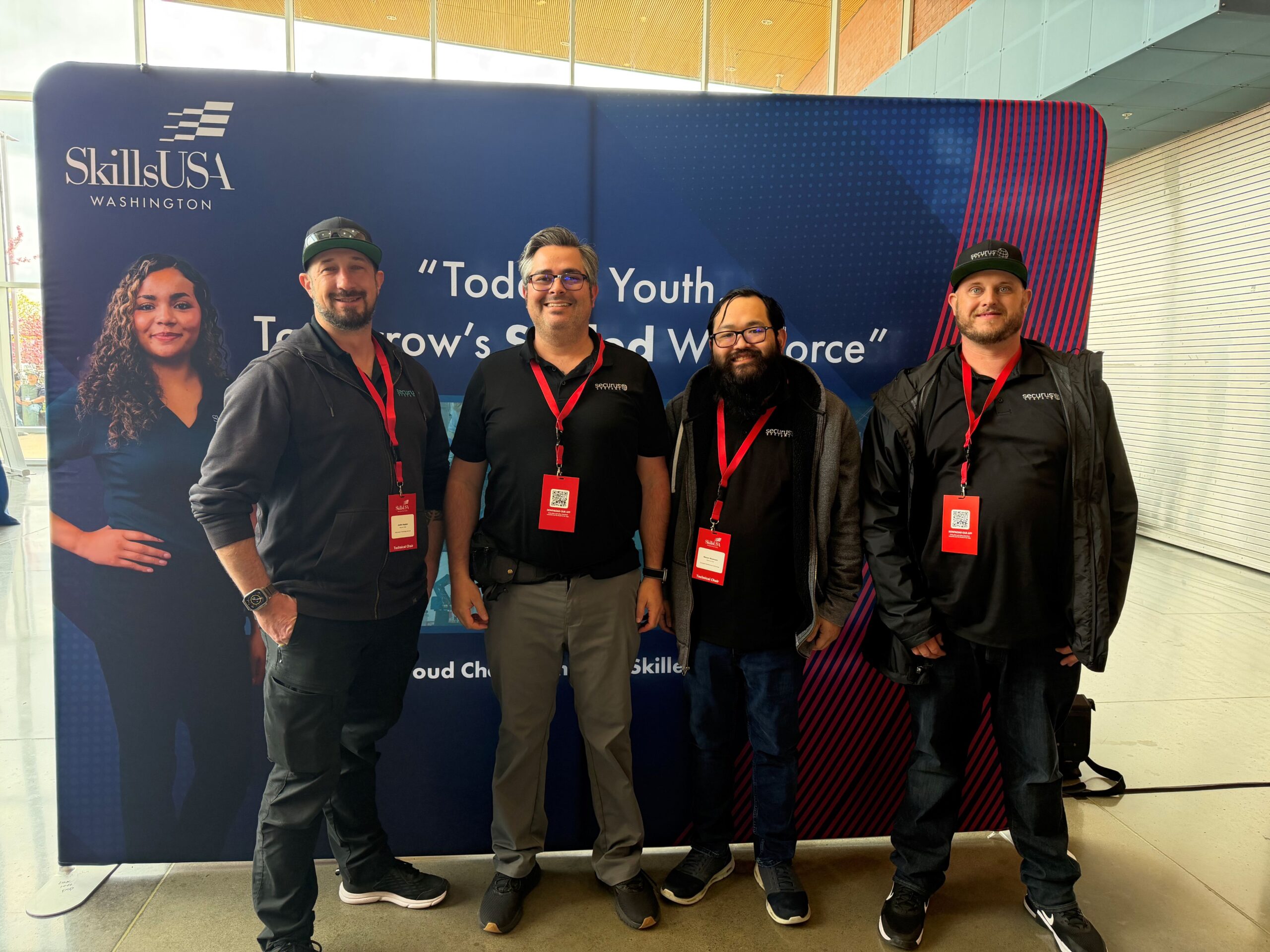 Securus team members standing a row to help illustrate IT infrastructure assessments