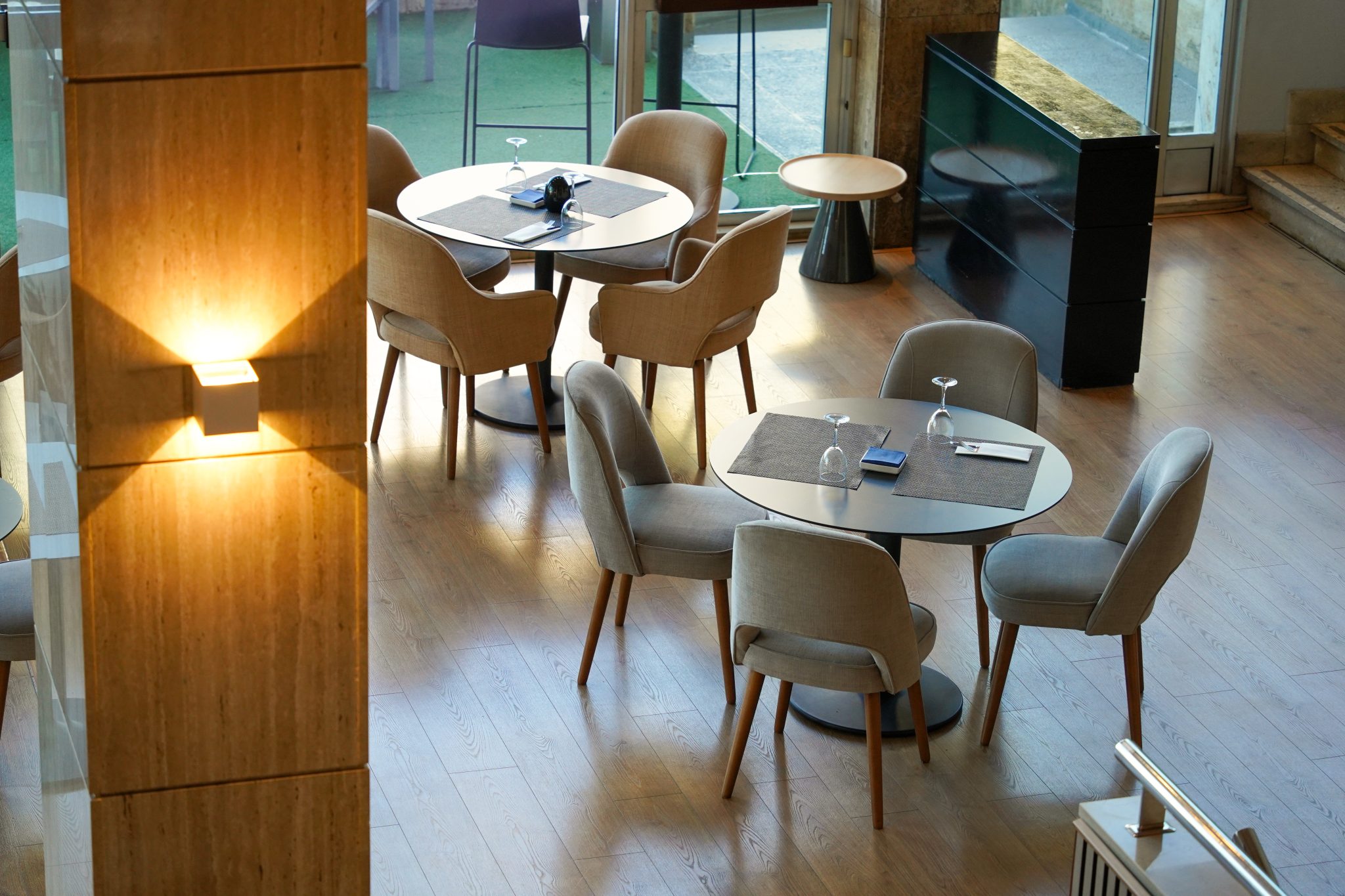 Stylish hotel lobby seating area where check-ins and guest services depend on reliable IT